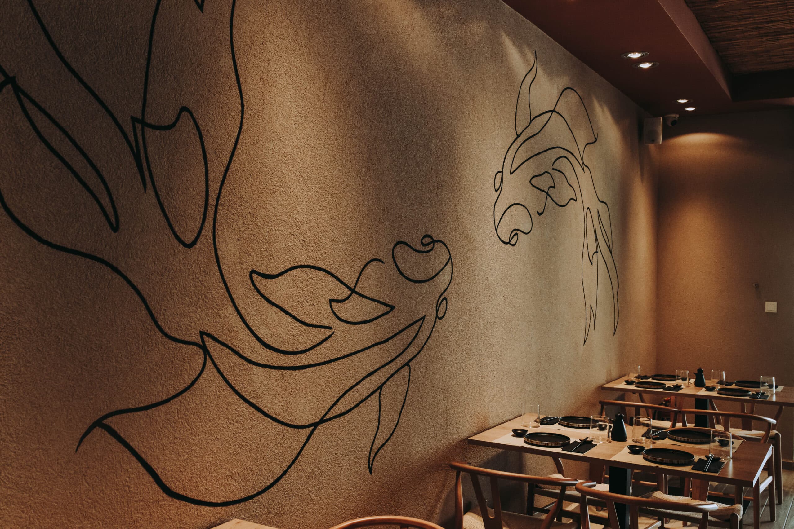 Japanese wall art in dining area